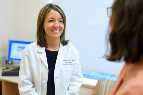 Andrea Barrio, a breast cancer surgeon at Memorial Sloan Kettering Cancer Center, talks to a patient